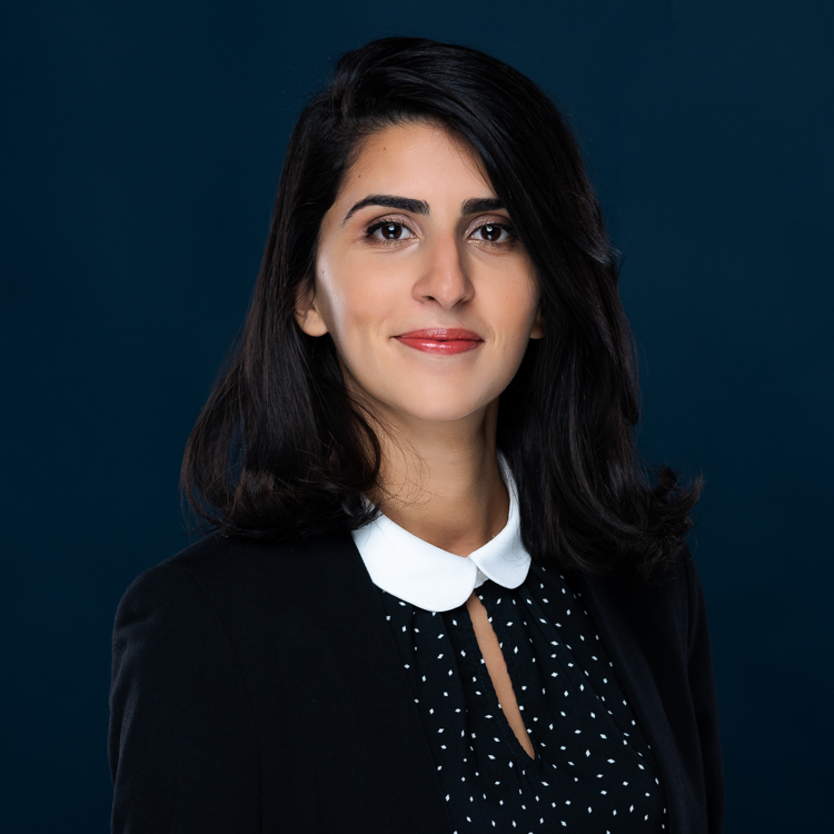 Headshot of a woman in a business suit
